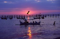 Fishermen setting out for the evening, Jimbaran Bay, Bali... by Douglas Van Blarcom 