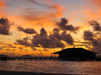 Sunset in Maldives by Loo Yoke Chen 
