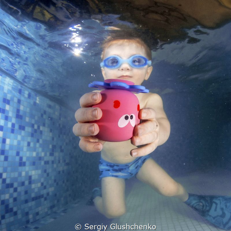 Children swimming by Sergiy Glushchenko 