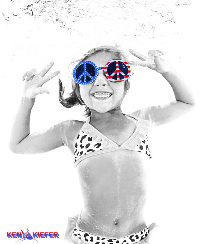 My niece goofing around underwater in the pool.   She's j... by Ken Kiefer 