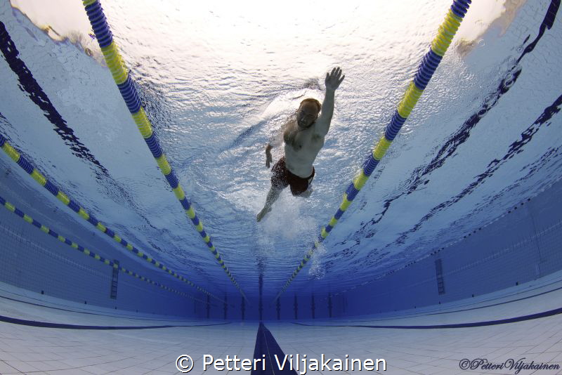 Lone swimmer by Petteri Viljakainen 