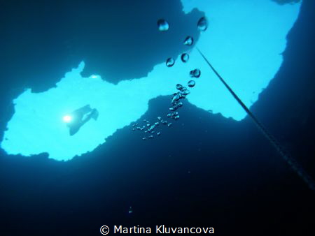 Freediver entering Cave Lučice GPS: N 43 18 12, E 16 27 1... by Martina Kluvancova 