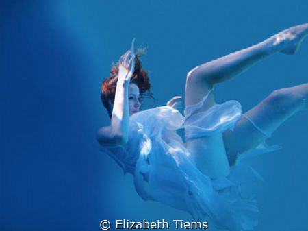 Taken in a pool, using scuba gear. Photoshop used to get ... by Elizabeth Tiems 