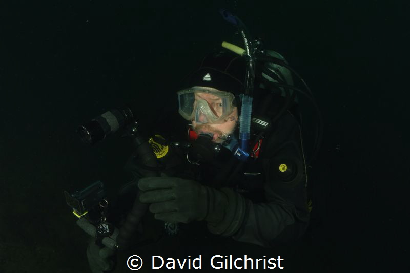 Searching for subject. Diver with Sony Video rig at the W... by David Gilchrist 