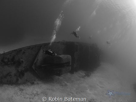 We were diving the wreck of the Tibbetts for a photo cour... by Robin Bateman 