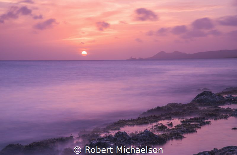 Sunset at the Jeff Davis, MD Memorial Dive Site in Bonaire by Robert Michaelson 