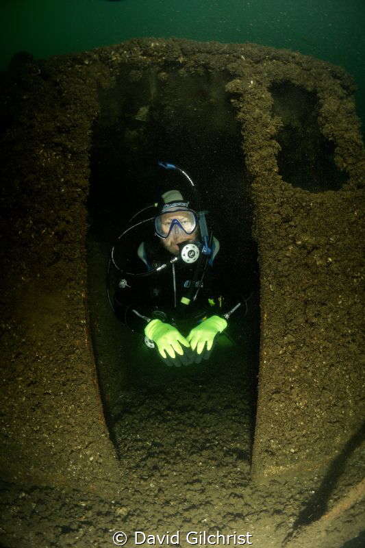 Diver emerges from boat at the Welland Scuba Park. by David Gilchrist 