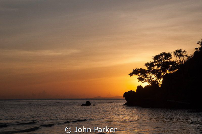 Sunset in Raja Ampat by John Parker 