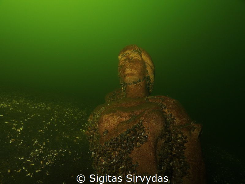 The virgin of the deeps. Statue in the lake Plateliai. by Sigitas Sirvydas 