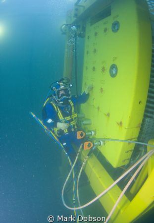 Diver running a testing schedule on an ROV panel which co... by Mark Dobson 