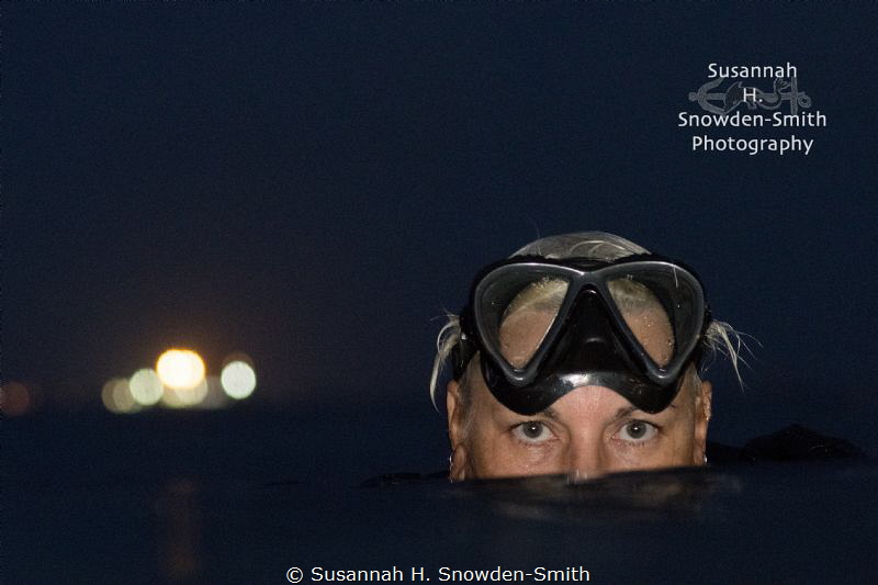 "Navy Night" - Carrie Dutchak surfaces following a dusk d... by Susannah H. Snowden-Smith 