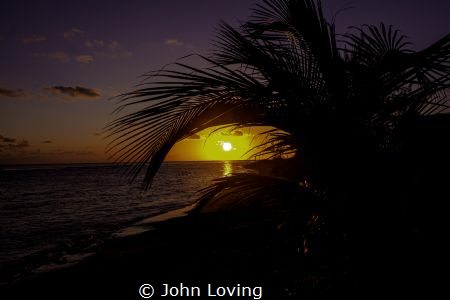 Sunset on Little Cayman by John Loving 
