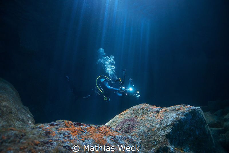 Diver in Urseling Cave / São Jorge / Azores by Mathias Weck 