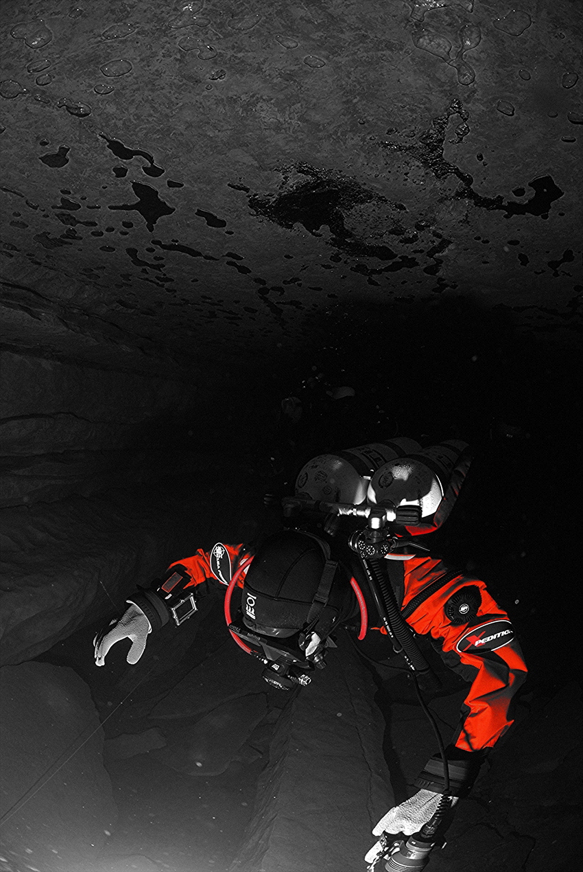 Diver in a cave in France by Andy Kutsch 