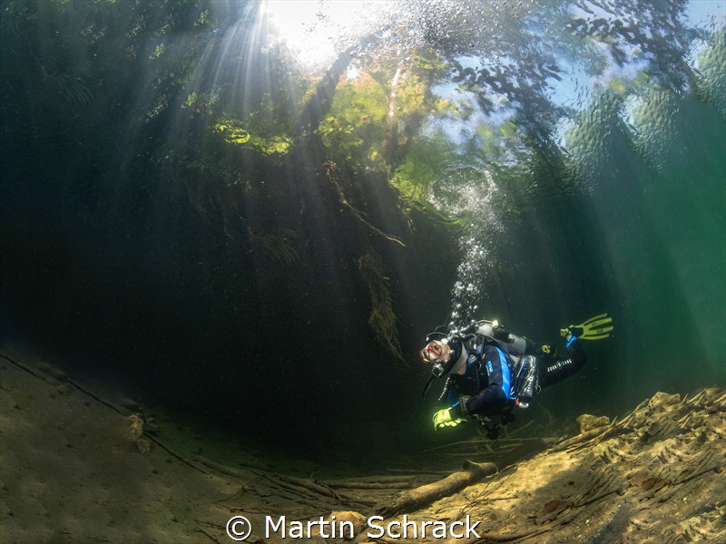 River diving in a mountain river in Austria that promises... by Martin Schrack 