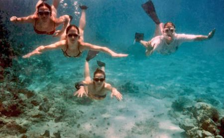 This is an old photo of my wife and kids snorkeling in St... by David Heidemann 