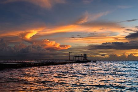 Third Island Pier. View of Sunset from Eniburr Island. by Lee Craker 