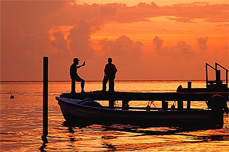 Sunset chatting on the beatiful island of Roatan, Honduras. by Shawn Jackson 