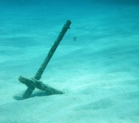 Simplicity, lone anchor under the water. by Lora Tucker 