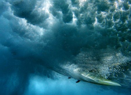The Ride. This photo was taken under a breaking wave at S... by Mathew Cook 