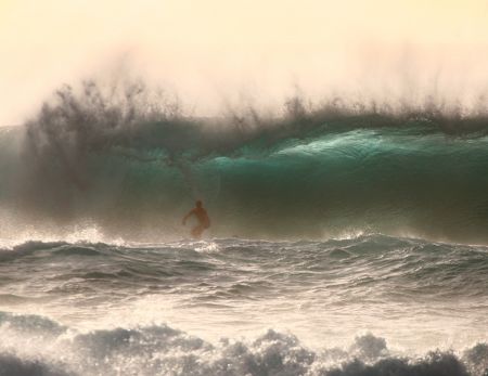 Surfing in the Evening. Surfer in deep at Banzai Pipeline. by Mathew Cook 