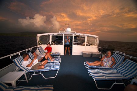 The top deck of the Caribbean Explorer 2 of the coast of ... by Terry Moore 