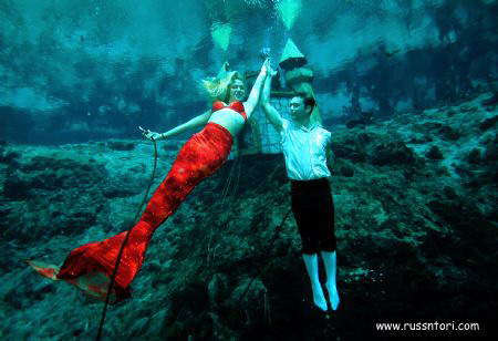 Weeki Wachi Springs, central Florida.  Mermaid and Merman. by Victoria Collins 