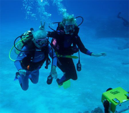 Dive Buddies. Mother and daughter. Age 82 and 65! Mom sta... by Paul Holota 