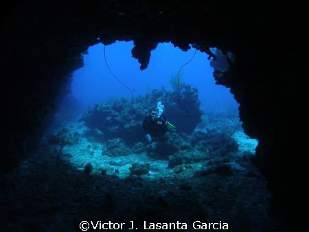 view from in to out of the chimney dive site in parguera ... by Victor J. Lasanta Garcia 