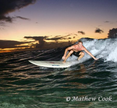 "Twilight Surfer"  While the waves were'nt deathly large,... by Mathew Cook 