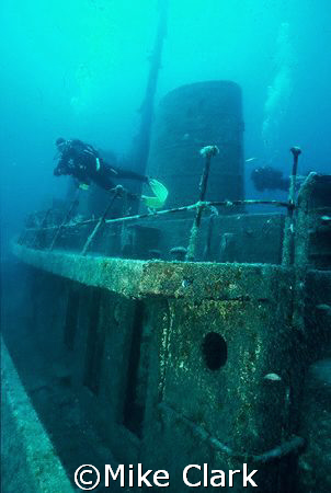 Diver fins above Rozi Wreck Companionway.
Malta.
Nik V
... by Mike Clark 