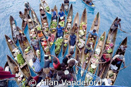 Market Day aboard Bilikiki at the Florida Island Group, S... by Allan Vandeford 