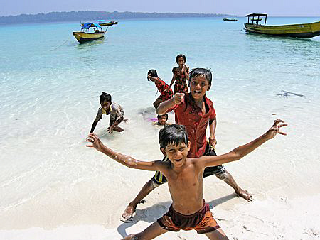 Kids on the beach, Andaman Islands by Doug Anderson 