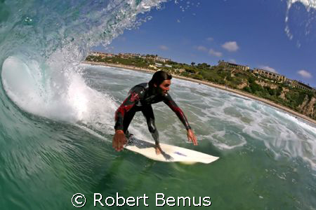 Shadows and light/surfer_surfing_barrel_tube by Robert Bemus 