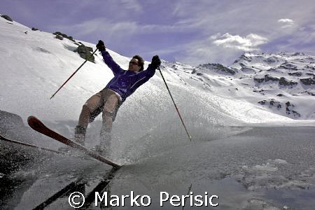 This time a skier takes a run at Lac De Lou in the french... by Marko Perisic 