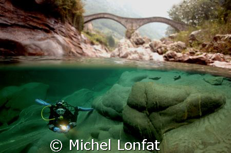 Beautiful dives in the great waters of the Verzasca River. by Michel Lonfat 
