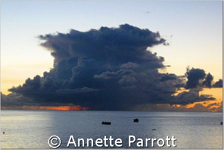 Cumulonimbus.
Sunset.
Fishing boats in the distance. by Annette Parrott 