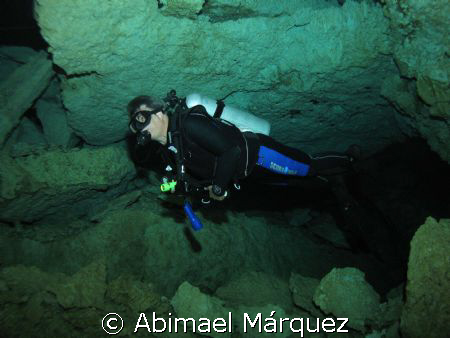 Evelio in the "Cenote Chikin Ha" by Abimael Márquez 