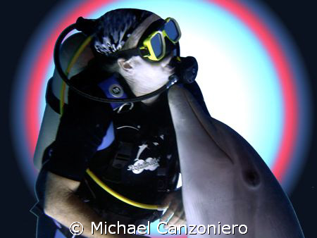 "Forbidden Love - Interspecies Style" 
Curacao "Dolphin ... by Michael Canzoniero 