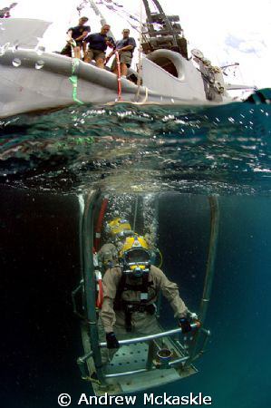 US Navy Divers going to the office. by Andrew Mckaskle 