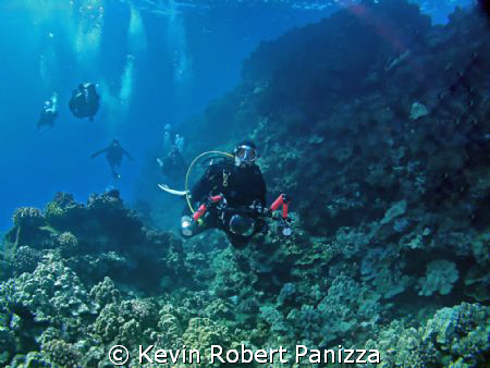 Dan from C3 Submerged shooting with a group of tourists.
... by Kevin Robert Panizza 