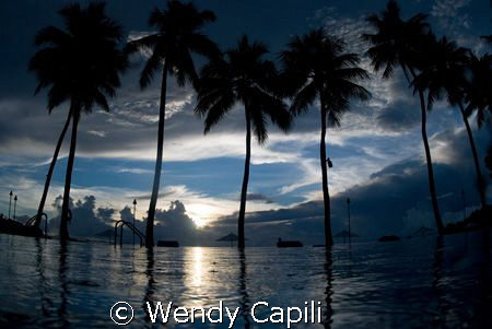 Relaxing sunset at Palau Pacific Resort Sigma 15mm + Niko... by Wendy Capili 