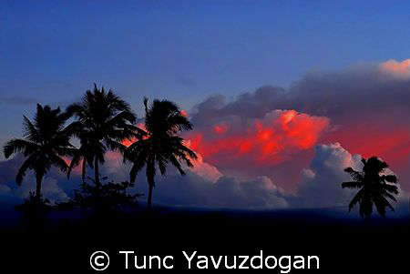 Sunset at Bunaken Marine Park. by Tunc Yavuzdogan 