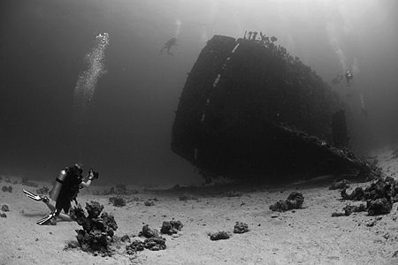 Heather photographing divers on the Carnatic - Red Sea - ... by Jim Garland 