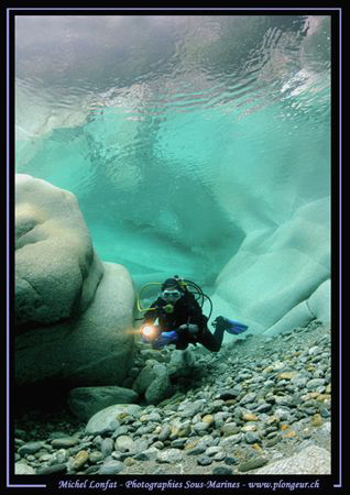 Diving the clear and fresh water of the Verzasca River ..... by Michel Lonfat 