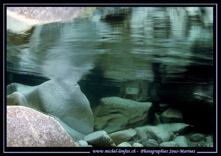 Reflexion.... Cold water's of the Verzasca River. ... :O)... by Michel Lonfat 