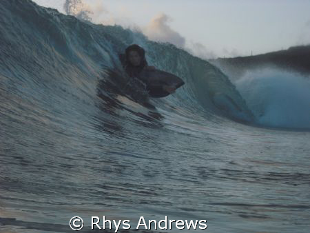 just a little shot of my mate dropping into a barrel by Rhys Andrews 
