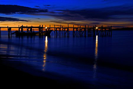 Sun Set at Kri Island by Tunc Yavuzdogan 