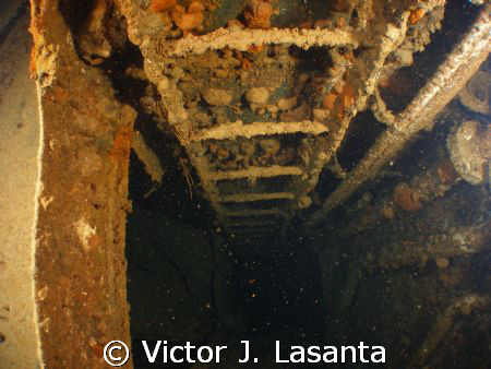 welcome to the engine room, this are the ladders that tak... by Victor J. Lasanta 