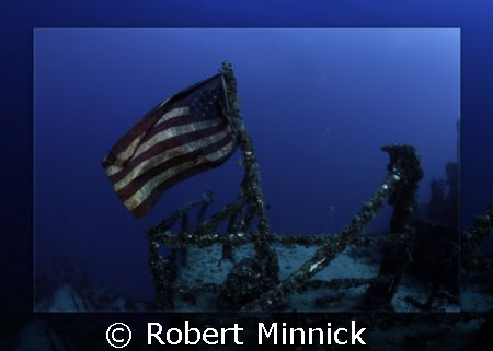 Flag on the Spiegel Grove Key Largo, Fl. by Robert Minnick 